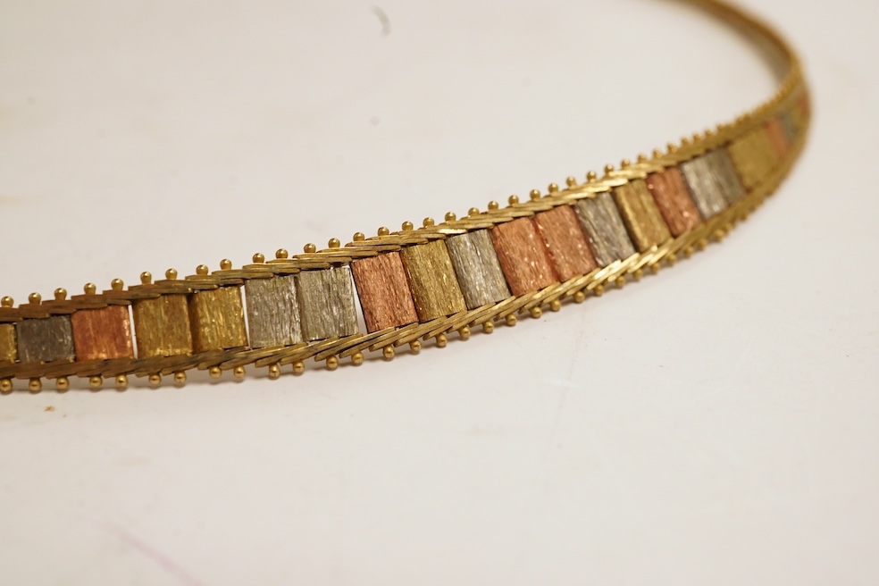 A modern tri-coloured 9ct gold necklace and matching bracelet, 16.5 grams. Condition - fair to good